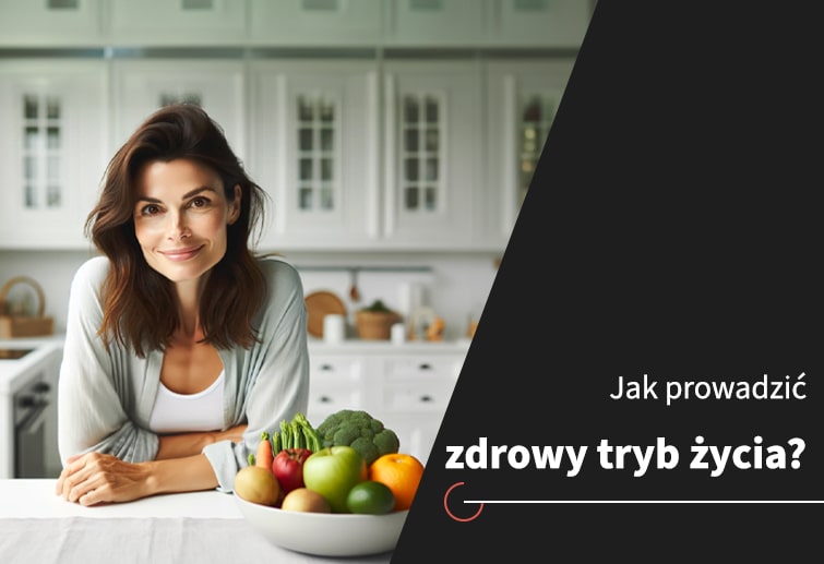 Jak prowadzić zdrowy tryb życia? Kobieta stoi w kuchni przy blacie, na którym stoi kosz owoców.